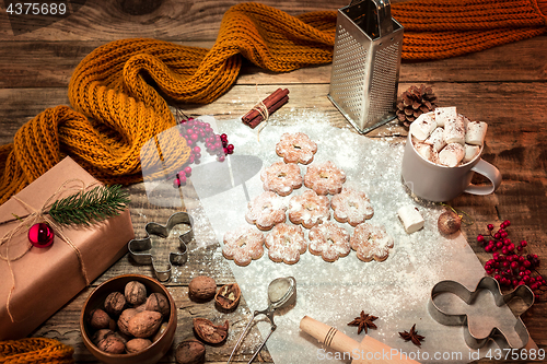 Image of Homemade bakery making, gingerbread cookies in form of Christmas tree close-up.