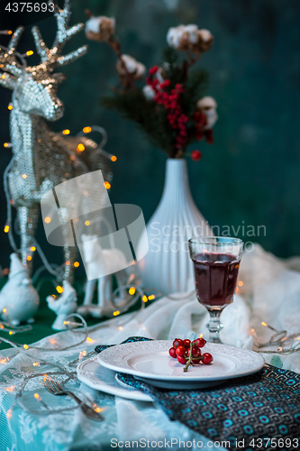 Image of Beautiful Christmas table setting with decorations