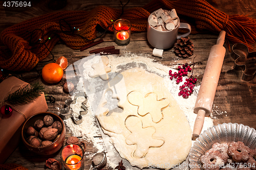 Image of Homemade bakery making, gingerbread cookies in form of Christmas tree close-up.