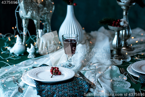 Image of Beautiful Christmas table setting with decorations