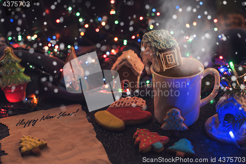 Image of Christmas cookies and cup of tea
