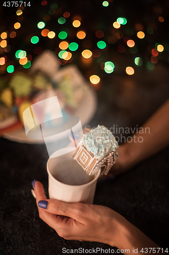 Image of Christmas cookies and cup of tea