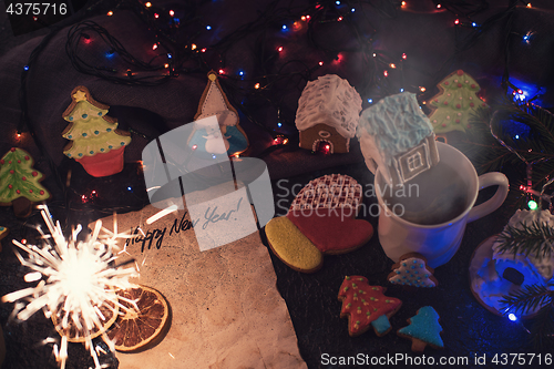 Image of Christmas cookies and cup of tea