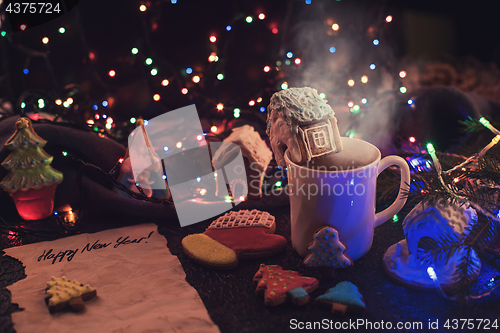 Image of Christmas cookies and cup of tea