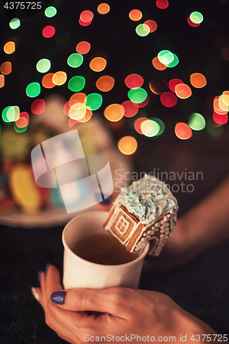 Image of Christmas cookies and cup of tea