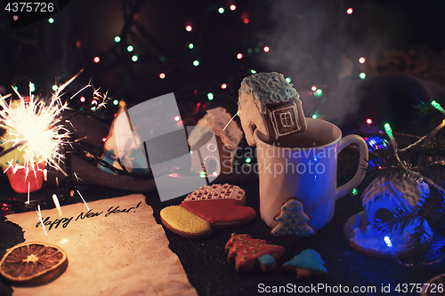 Image of Christmas cookies and cup of tea