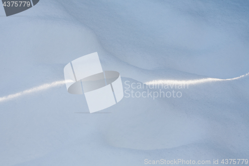 Image of sun ray on snow surface