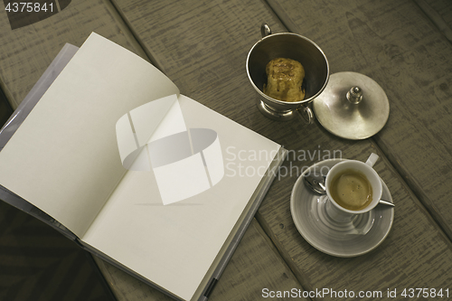 Image of coffee and a book