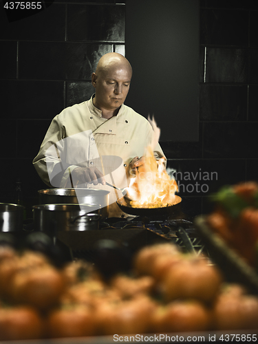 Image of professional chef cooking