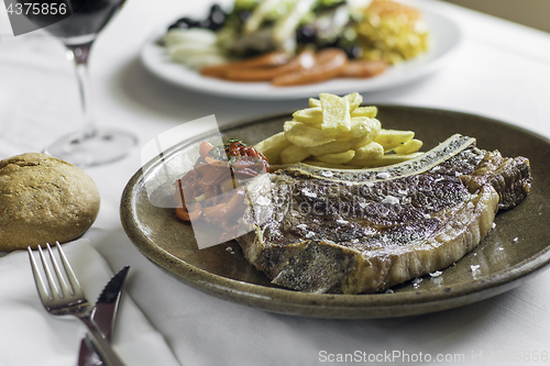 Image of beef with potatoes and peppers