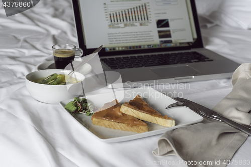 Image of business breakfast and laptop