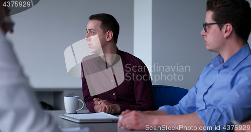 Image of Business Team At A Meeting at modern office building