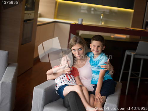 Image of Young Family Using A Tablet To Make Future Plans