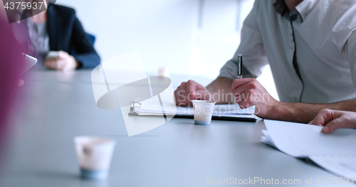 Image of Business Team At A Meeting at modern office building