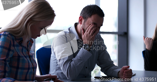 Image of Business Team At A Meeting at modern office building