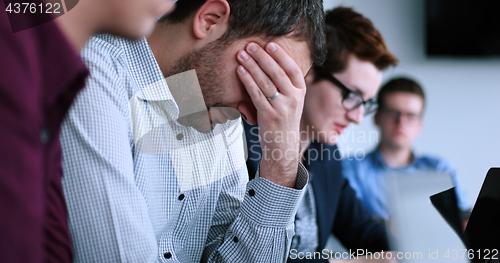 Image of Business Team At A Meeting at modern office building