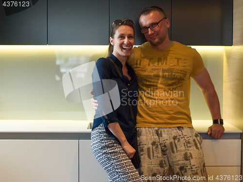 Image of Young couple in the kitchen