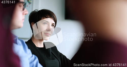 Image of Business Team At A Meeting at modern office building