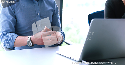 Image of young businessman in startup office
