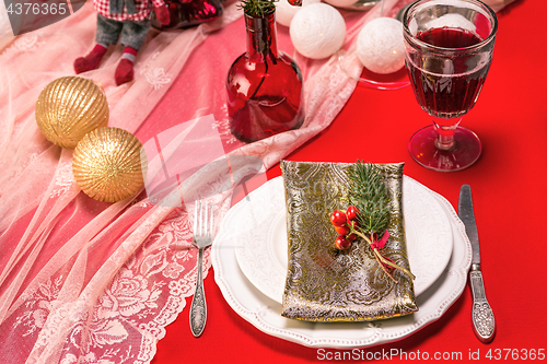 Image of Beautiful Christmas table setting with decorations