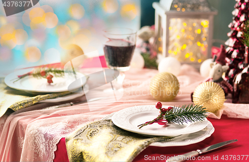 Image of Beautiful Christmas table setting with decorations