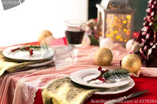 Image of Beautiful Christmas table setting with decorations