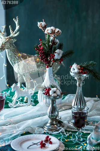 Image of Beautiful Christmas table setting with decorations