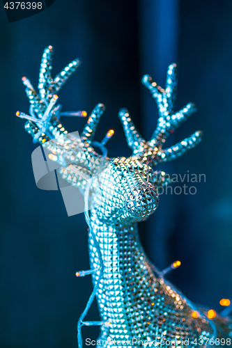 Image of Christmas and New Year decorations with silver deer.