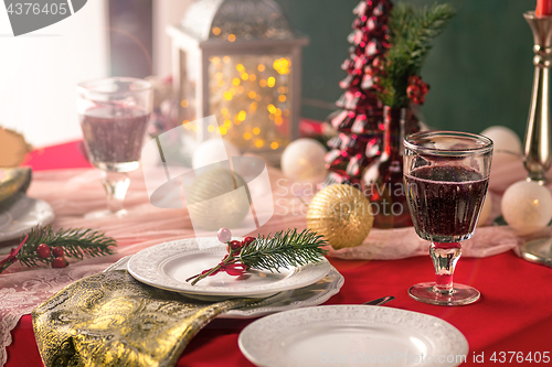 Image of Beautiful Christmas table setting with decorations