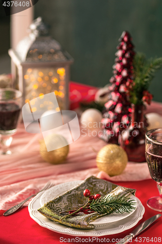 Image of Beautiful Christmas table setting with decorations