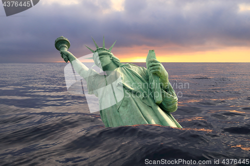 Image of Statue of Liberty sinking in the ocean