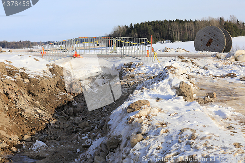 Image of Laying Underground Power Cable in Winter