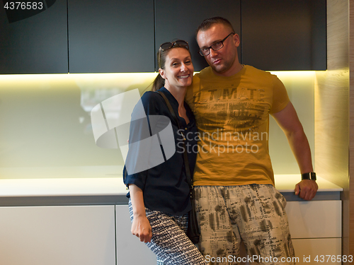 Image of Young couple in the kitchen