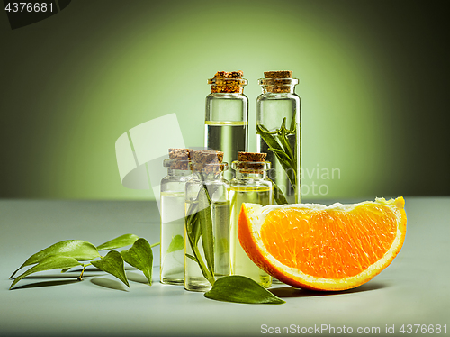 Image of oranges oil and Orange