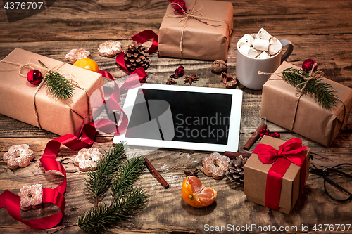 Image of The winter composition. The gifts and cup with marshmallow