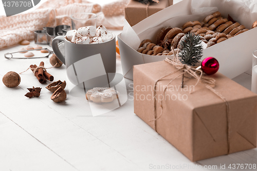 Image of The winter composition. The gifts and cup with marshmallow
