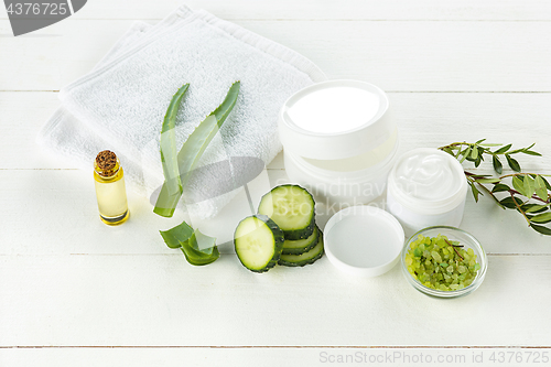 Image of Cucumber and aloe cosmetic cream face, skin and body care hygiene moisture lotion