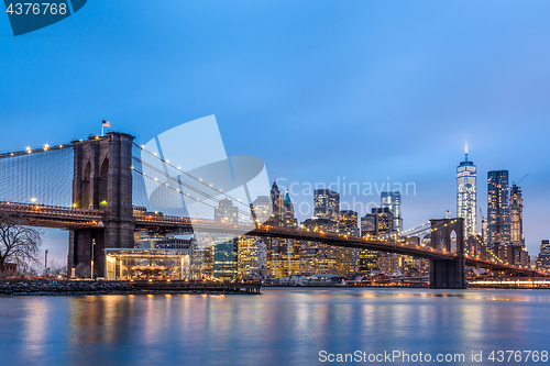 Image of Brooklyn bridge at dusk, New York City.