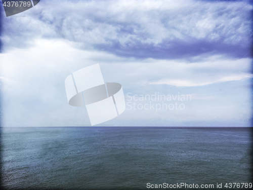 Image of Grungy image of stormy sea and clouds