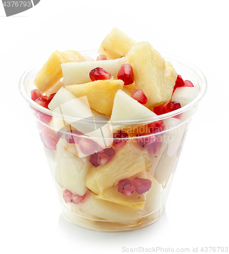 Image of fresh fruit pieces salad in plastic cup