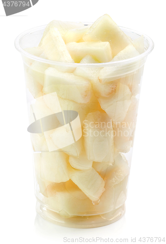 Image of fresh melon pieces salad in plastic cup