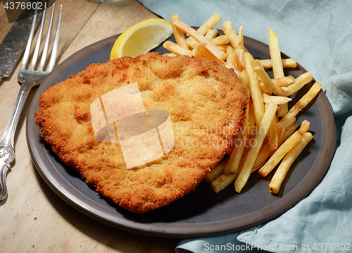 Image of Weiner Schnitzel with fried Potatoes