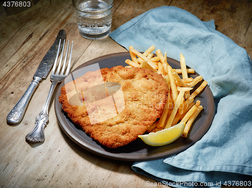 Image of Weiner Schnitzel with fried Potatoes