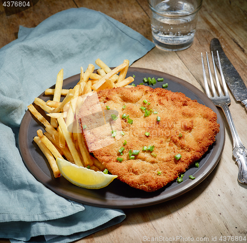 Image of Weiner Schnitzel with fried Potatoes