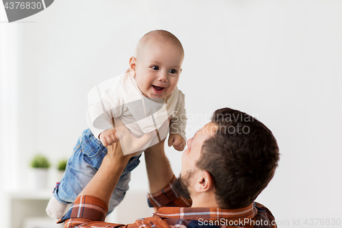 Image of happy little baby boy with father