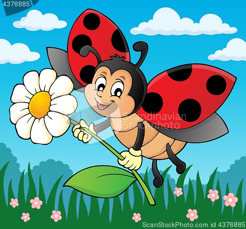 Image of Ladybug holding flower theme image 2