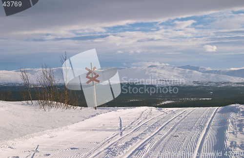 Image of Winter panorama from Lifttoppen, ski tracks on snow marked with red cross sign, V&#229;l&#229;dalen, Sweden