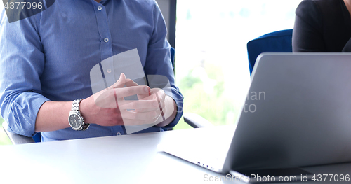 Image of young businessman in startup office