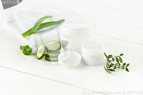 Image of Cucumber and aloe cosmetic cream face, skin and body care hygiene moisture lotion