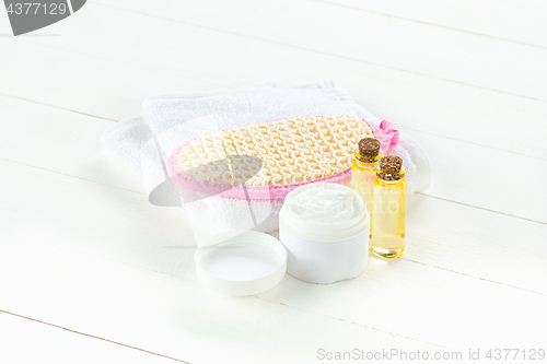 Image of Spa towels, stone and oils